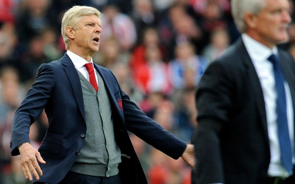 Arsene Wenger feels Arsenal were denied by the match officials - AP