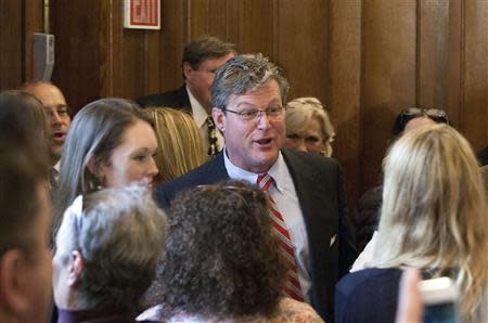 Ted Kennedy Jr. (C), son of the late Democratic Massachusetts Senator Edward M. Kennedy, speaks to supporters and the media after declaring his candidacy for a seat in the Connecticut Senate, in Branford, Connecticut April 8, 2014. REUTERS/Michelle McLoughlin