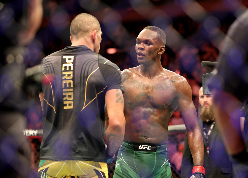 Nov 12, 2022; New York, NY, USA; Israel Adesanya (red gloves) and Alex Pereira (blue gloves) after their UFC 281 bout at Madison Square Garden. Mandatory Credit: Jessica Alcheh-USA TODAY Sports