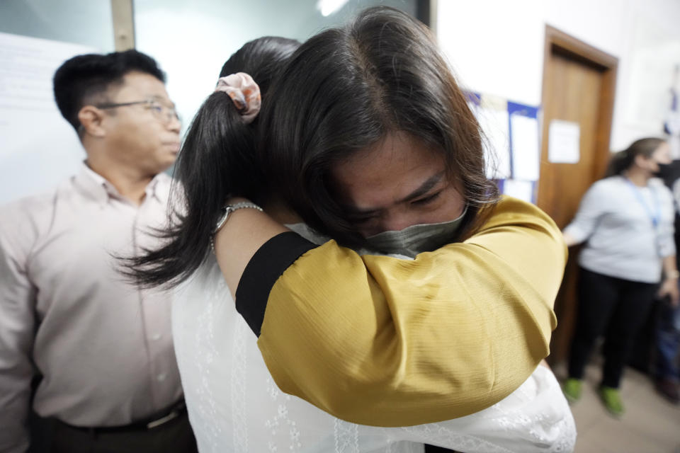 VOD, Voice of Democracy, news coordinator Lim Thida, front right, cries at her office in Phnom Penh, Cambodia Monday, Feb. 13, 2023. Cambodia's Prime Minister Hun Sen on Sunday, Feb. 12, ordered one of the handful of independent media broadcasters to shut down for publishing an article he said intentionally slandered his son in connection with the country's relief assistance to earthquake victims in Turkey. (AP Photo/Heng Sinith)