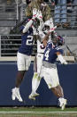 Mississippi defensive backs A.J. Finley (21) and Tylan Knight (4) knock away the end-zone pass to Mississippi State wide receiver Jaden Walley (31) during the second half of an NCAA college football game, Saturday, Nov. 28, 2020, in Oxford, Miss. Mississippi won 31-24. (AP Photo/Rogelio V. Solis)