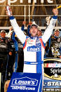 CHARLOTTE, NC - MAY 19: Jimmie Johnson, driver of the #48 Lowe's Patriotic Chevrolet, celebrates in victory lane after winning the NASCAR Sprint All-Star Race at Charlotte Motor Speedway on May 19, 2012 in Charlotte, North Carolina. (Photo by Jared C. Tilton/Getty Images)