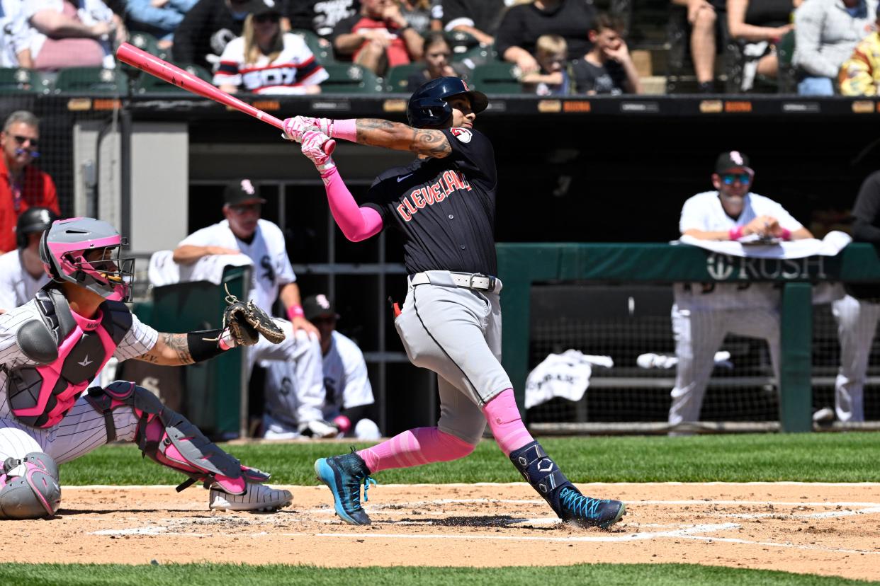 Guardians shortstop Brayan Rocchio hits a sacrifice fly against the Chicago White Sox in the third inning, May 12, 2024, in Chicago.