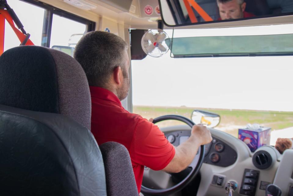  Sentinel Public Schools Superintendent Jason Goostree drives an afternoon route. Due to absences caused by state testing, his route that day was a short one. (Photo by Beth Wallis/StateImpact Oklahoma)