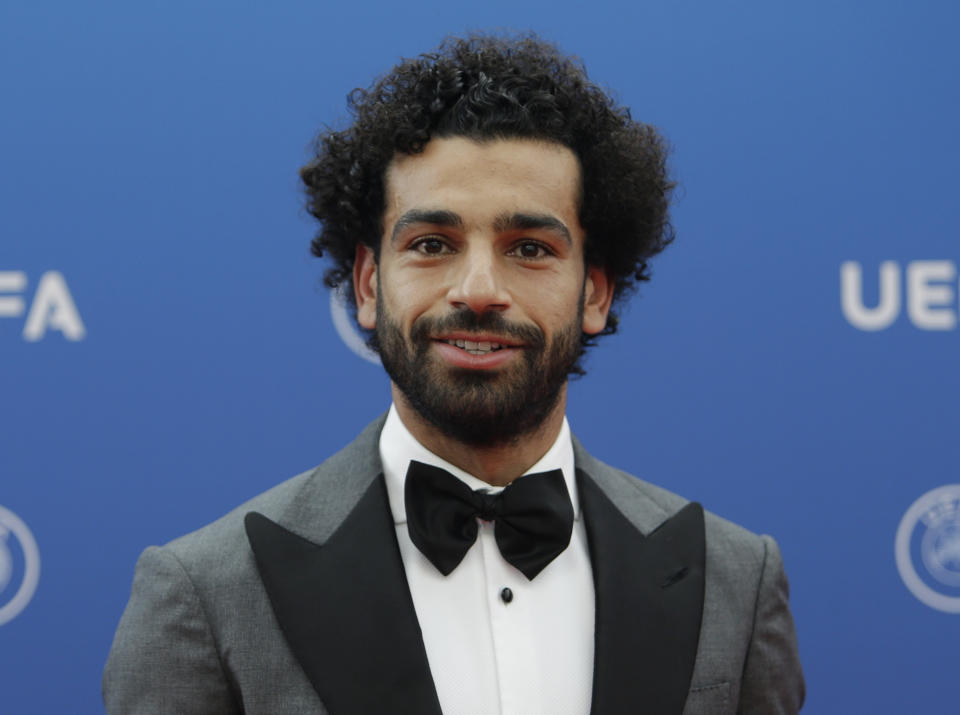 Liverpool's soccer player Egyptian Mohamed Salah arrives for the UEFA Champions League draw at the Grimaldi Forum, in Monaco, Thursday, Aug. 30, 2018. (AP Photo/Claude Paris)