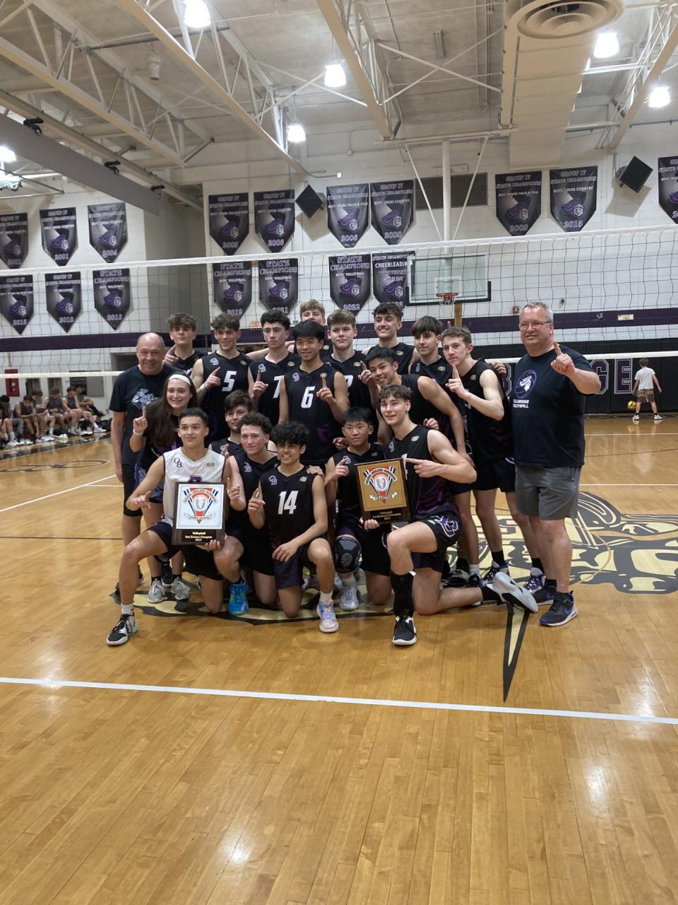 The Old Bridge boys volleyball team poses after winning the GMCT championship on May 23, 2023.
