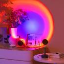 <p>The <span>Sunset Projection Lamp</span> ($19) takes mood lighting to a whole new level - its head can be rotated 180 degrees to adjust the size and shape of the projected light.</p>