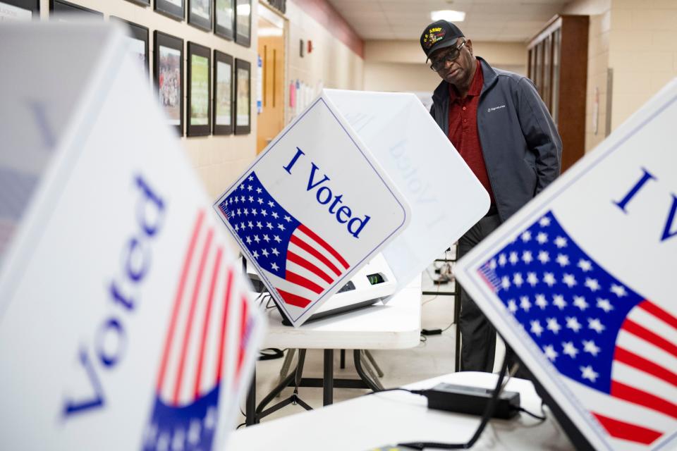 Henry Dirton Jr., 75, casts his vote at Greenville Senior High School during the Democratic primary election in Greenville, S.C., on Saturday, Feb. 3, 2024.