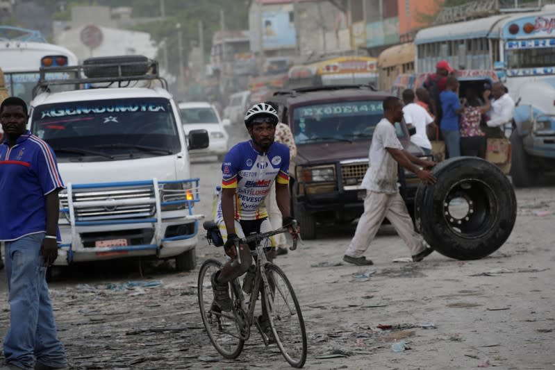 The Wider Image: Haiti's cyclists brave protests and poor roads in race for gold