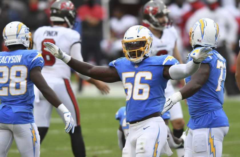 Los Angeles Chargers linebacker Kenneth Murray (56) celebrates after Tampa Bay Buccaneers.