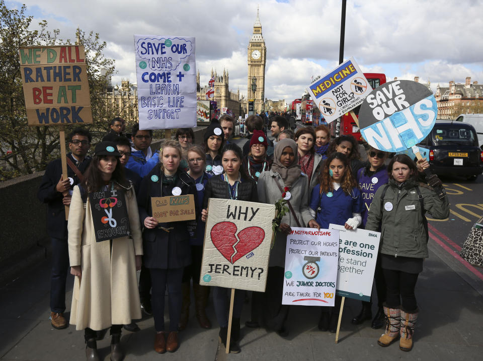 Protesters outside St Thomas' Hospital in London, as thousands of junior doctors have begun the first all-out strike in the history of the NHS after the Health Secretary said the Government would not be 