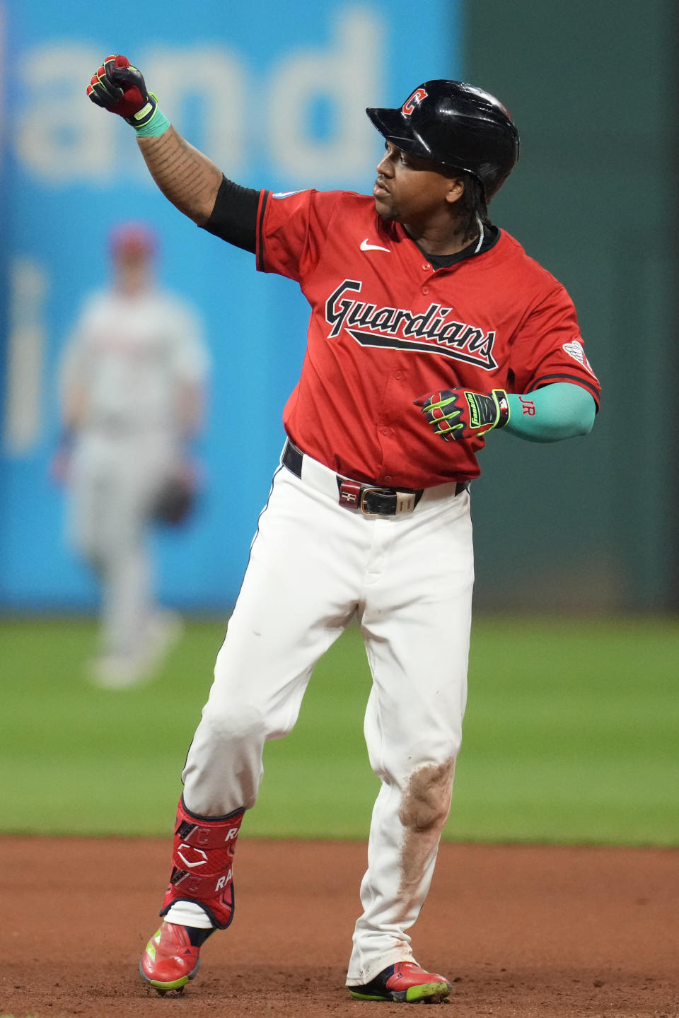 Cleveland Guardians' Jose Ramirez gestures after hitting a double in the seventh inning of a baseball game against the Cincinnati Reds in Cleveland, Tuesday, Sept. 24, 2024. (AP Photo/Sue Ogrocki)