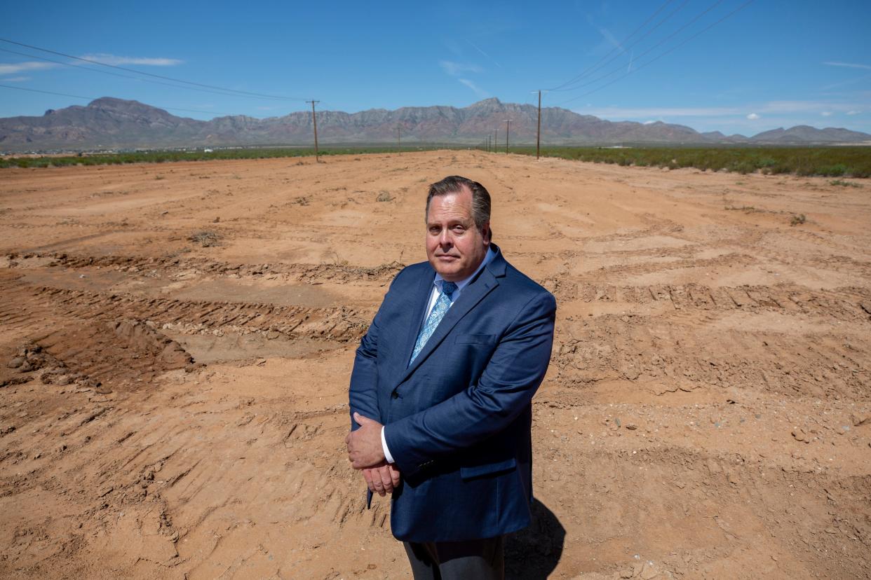 El Paso Water Chief Executive Officer John Balliew, in May 2023, stands near an arroyo near McCombs Street in Northeast El Paso that will be rebuilt as a water-reclamation project. The start of the arroyo is not far from the vacant land where a proposed Meta data center is to be built.