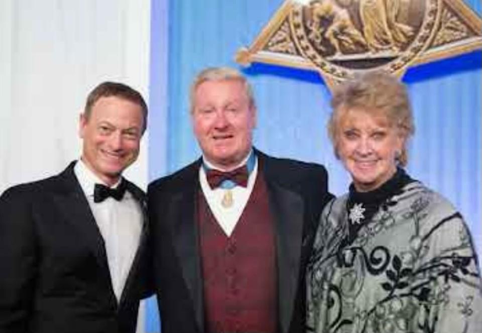 Actor Gary Sinise (left) is joined by Sammy Lee Davis and Dixie Davis.