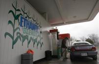 A worker pumps gasoline blended with 10 percent ethanol at the UPI Energy gas station in Chatham, Ontario in this April 11, 2008 file photo. REUTERS/Mark Blinch/Files