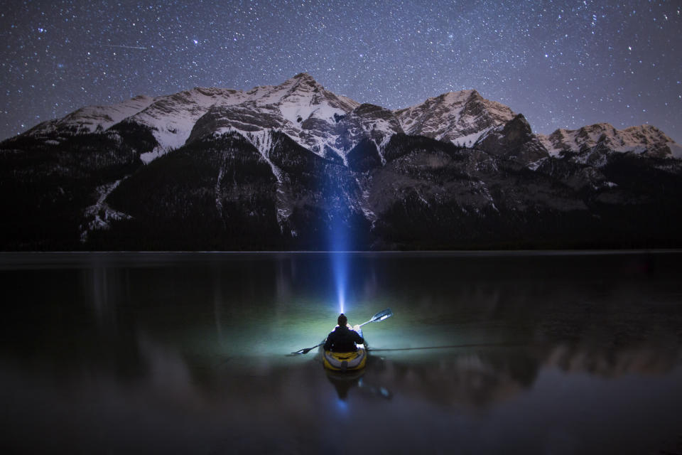&ldquo;Working alone and out in remote locations is always time-consuming, and it involves a lot of back and forth to get the shot,&rdquo; says <strong>Paul Zizka </strong>of this self-portrait he took in a kayak on Goat Lake in the Canadian Rockies. &ldquo;I had been planning on visiting this location for some time, and on this night the conditions were perfect. The stars danced across the surface of the lake, and it felt like I was gliding through the night sky.&rdquo; Shooting a self-portrait at night isn&rsquo;t without its challenges, Zizka says. Keeping yourself still enough in a kayak so the camera can catch a sharp exposure is particularly daunting. &ldquo;I propped the kayak on top of a rock to help stabilize it once I was in the frame. It took a few tries, but eventually I got a frame with sharp focus that I could be happy with.&rdquo;