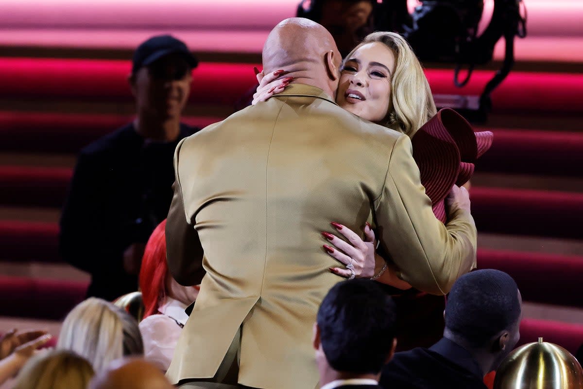 Adele and Dwayne Johnson met at the 2023 Grammys  (Getty Images )