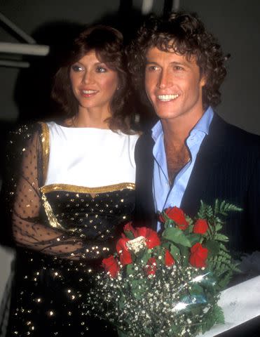 <p>Barry King/WireImage</p> Victoria Principal and Andy Gibb in 1981