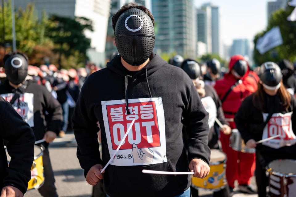 A member of the Korean Confederation of Trade Unions in a 