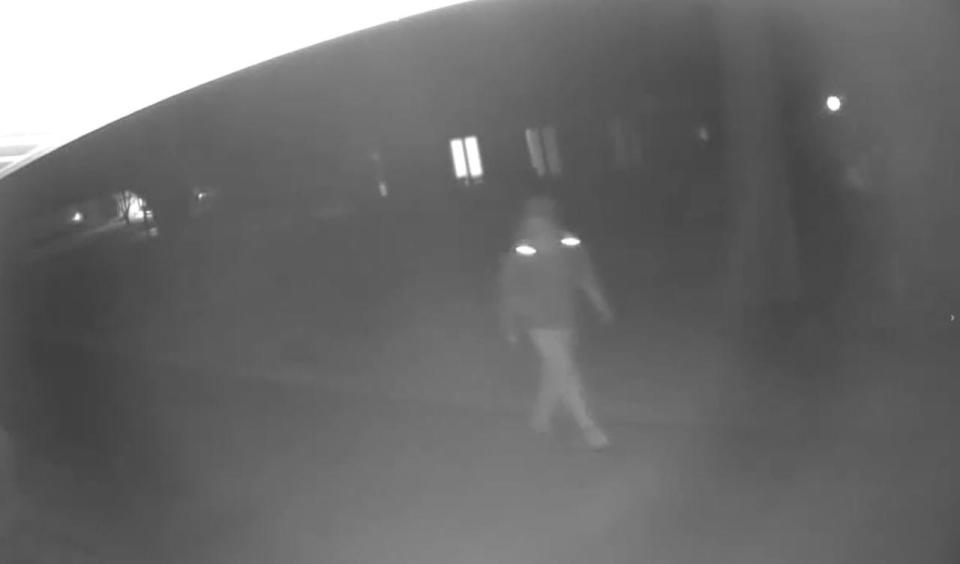 When police began investigating the murder, they spoke to Becky Bliefnick's next-door neighbors. They had a security camera set up in their driveway, which ran alongside Becky's house. Their camera didn't capture anything on the night of the murder, but it did capture something unusual about 24 hours earlier. At 1:05 a.m., a                  person was seen walking down the driveway towards the back of Becky's house and what appeared to be that same person was seen again—48 minutes later—this time, walking in the opposite direction.   / Credit: Adams County State's Attorney's Office