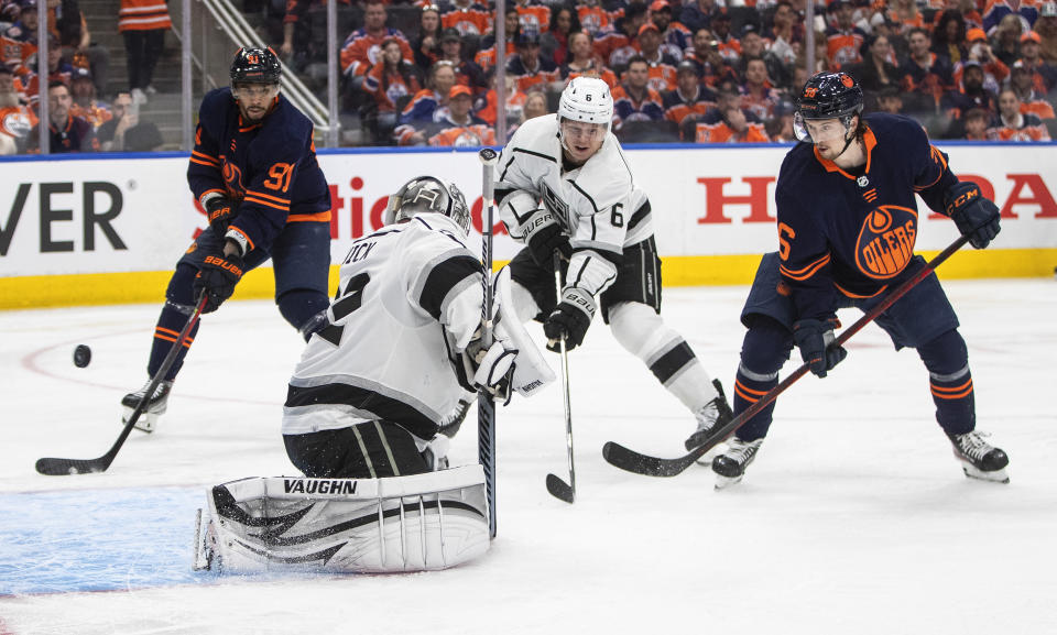 Los Angeles Kings' goalie Jonathan Quick (32) is scored on by Edmonton Oilers' Kailer Yamamoto (56) during the second period of Game 1 of an NHL hockey Stanley Cup first-round playoff series, Monday, May 2, 2022 in Edmonton, Alberta. (Jason Franson/The Canadian Press via AP)