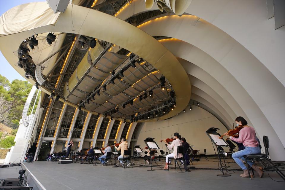 L.A. Phil musicians, spread across the Bowl stage.