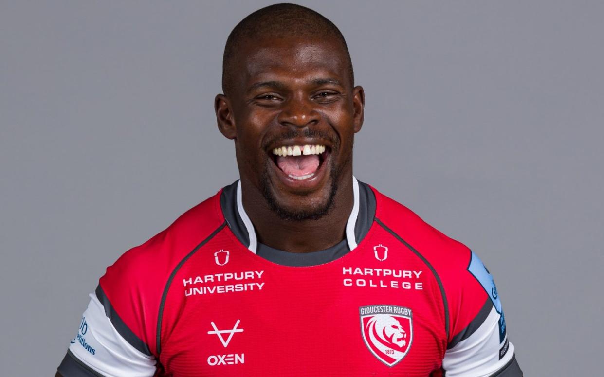 Christian Wade of Gloucester laughs as he poses for a portrait during the squad photocall for the 2024-2025 Premiership season