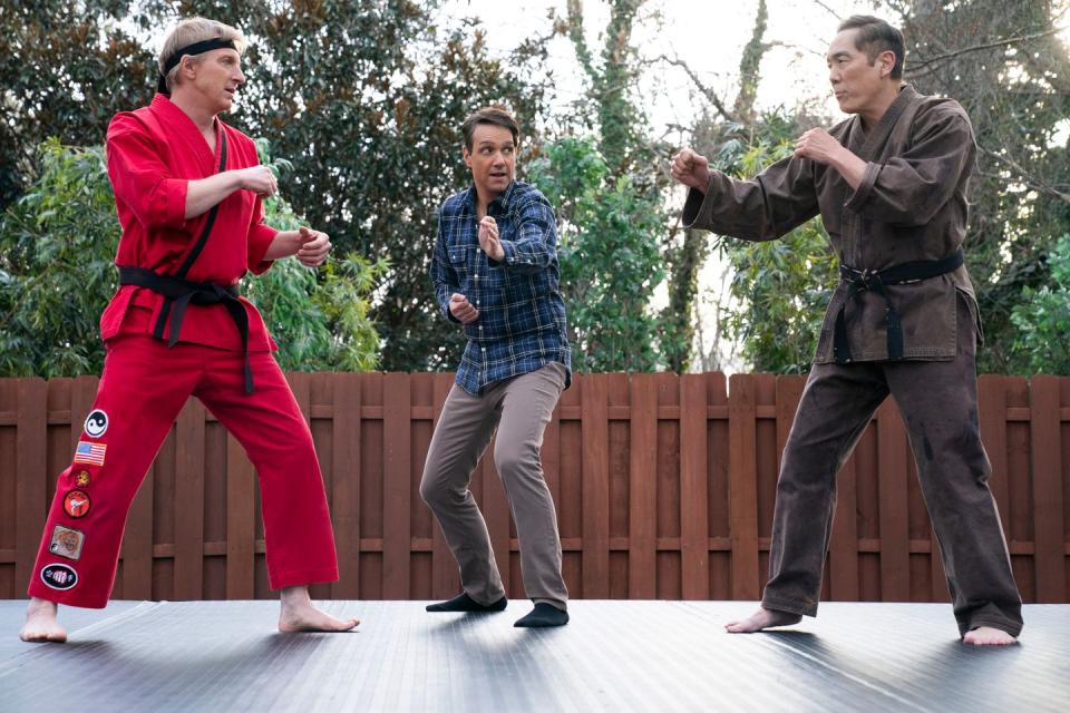 William Zabka as Johnny Lawrence, Ralph Macchio as Daniel Larusso, Yuji Okumoto as the Chosen One in Cobra Kai