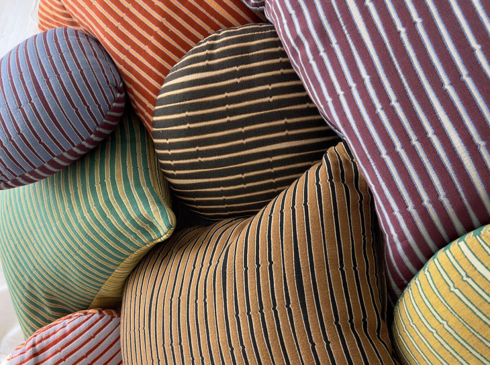A selection of Snag Stripe pillows by The Lawns
