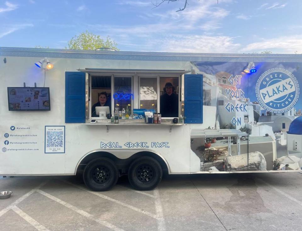 Plaka’s Greek Kitchen parked at Hop and Sting Brewing Co. in Grapevine on April 18, 2024. In the windows are the Snyder children, Isabel, left, and Gabriel.