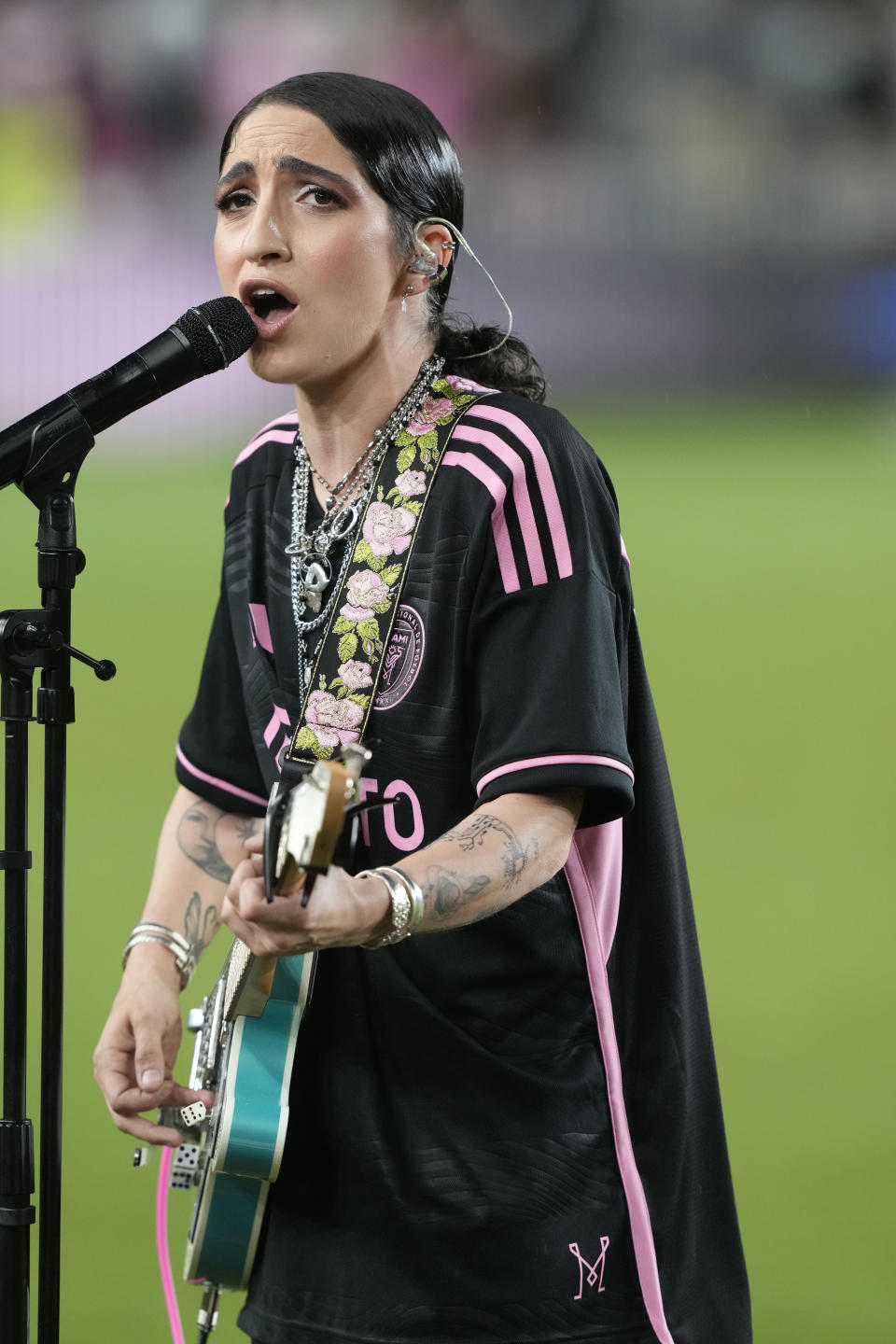 Emily Estefan signs the National Anthem before an MLS soccer match between the Inter Miami and the New York City, Saturday, Sept. 30, 2023, in Fort Lauderdale, Fla. (AP Photo/Marta Lavandier)