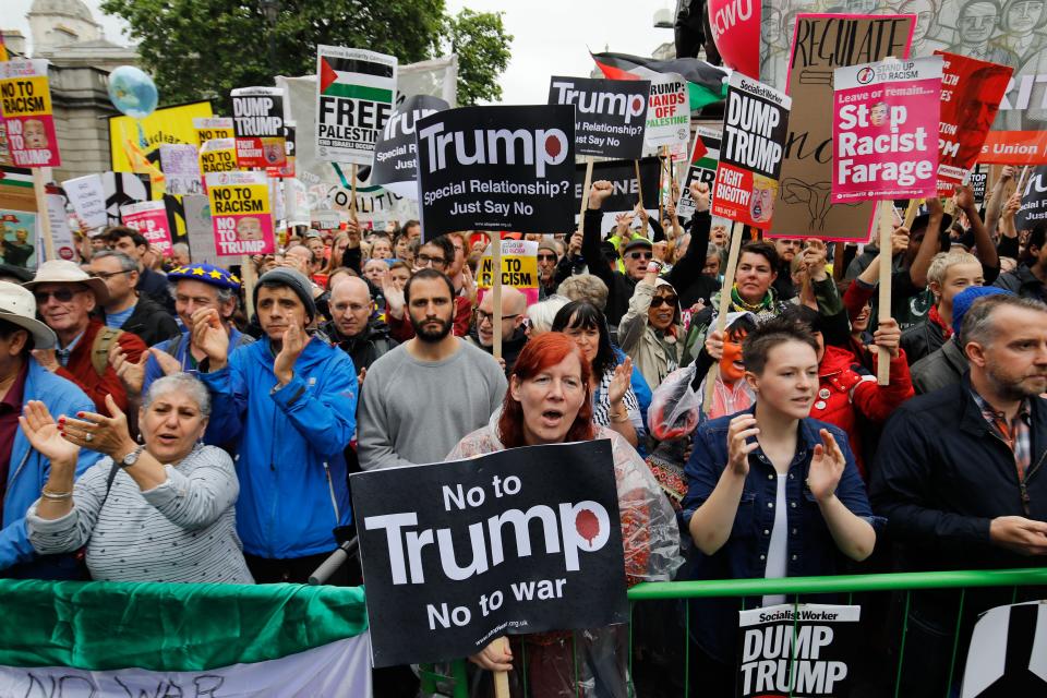 Protesters line the barrier on Whitehall during a demonstration against the State Visit of US President Donald Trump in central London on June 4, 2019, on the second day of Trump's three-day State Visit to the UK. - US President Donald Trump turns from pomp and ceremony to politics and business on Tuesday as he meets Prime Minister Theresa May on the second day of a state visit expected to be accompanied by mass protests. (Photo by Tolga AKMEN / AFP)        (Photo credit should read TOLGA AKMEN/AFP/Getty Images)