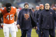 Chicago Bears head coach Matt Nagy, center, walks off the field with Joel Iyiegbuniwe after the team's 33-22 loss to the Arizona Cardinals during the second half of an NFL football game Sunday, Dec. 5, 2021, in Chicago. (AP Photo/Nam Y. Huh)