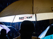 Reform Party umbrellas were sold at the rally. (Yahoo! photo/Alvin Ho)