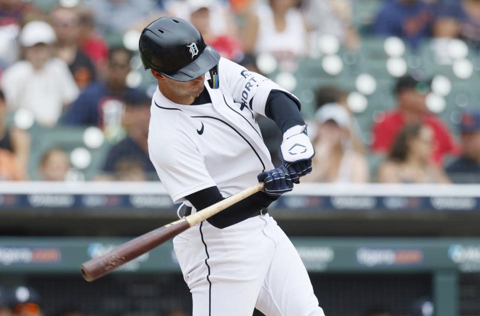 Tigers pinch hitter Zack Short hits a two-run home run during the eighth inning of the Tigers' 5-1 win over the Giants on Monday, July 24, 2023, at Comerica Park.