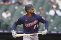 Minnesota Twins' Byron Buxton watches his solo home run during the eighth inning of a baseball game against the Detroit Tigers, Tuesday, April 6, 2021, in Detroit. (AP Photo/Carlos Osorio)