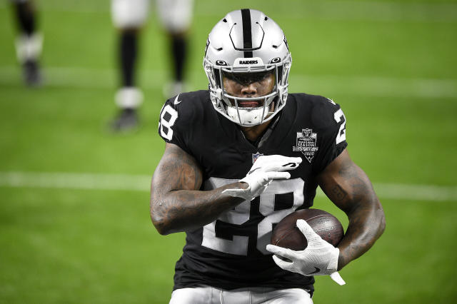 Oakland Raiders running back Josh Jacobs (28) celebrates after