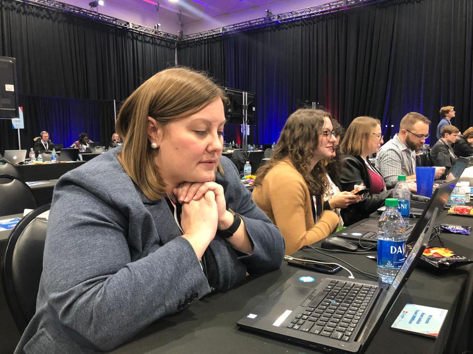 Annah Aschbrenner, 2020 editor for the USA TODAY Network, works at the CNN/Des Moines Register debate on Jan. 14, 2020, at Drake University in Des Moines, Iowa.