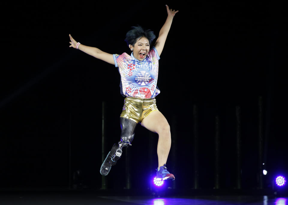 Kaede Maegawa, a Paralympian, participates in a fashion show dubbed "Amputee Venus Show" in Tokyo on Tuesday, Aug. 25, 2020. The fashion show was held in conjunction with the opening of the Tokyo Paralympic Games, now scheduled to open on Aug. 24, 2021. (AP Photo/Hiro Komae)