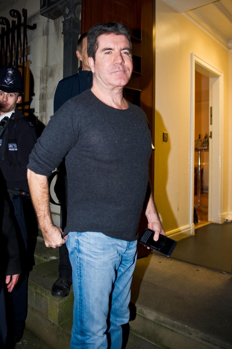 Simon Cowell pictured in December 2014 with a noticeably fuller frame. [Photo: Getty]