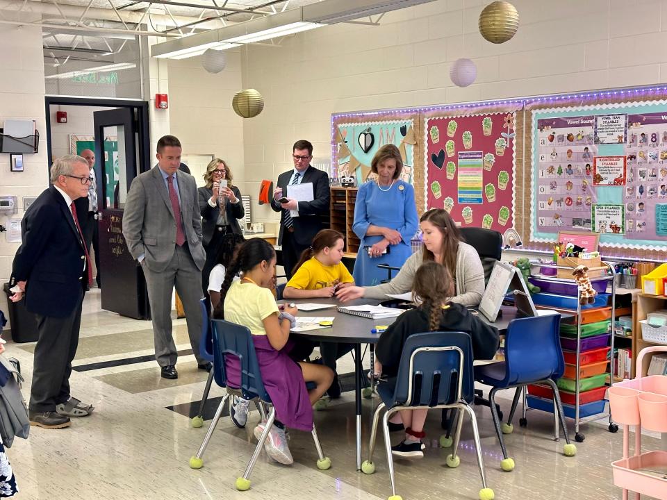 Governor Mike DeWine and Heath superintendent Dr. Trevor Thomas observe a reading class at Stevenson Elementary School on Wednesday.