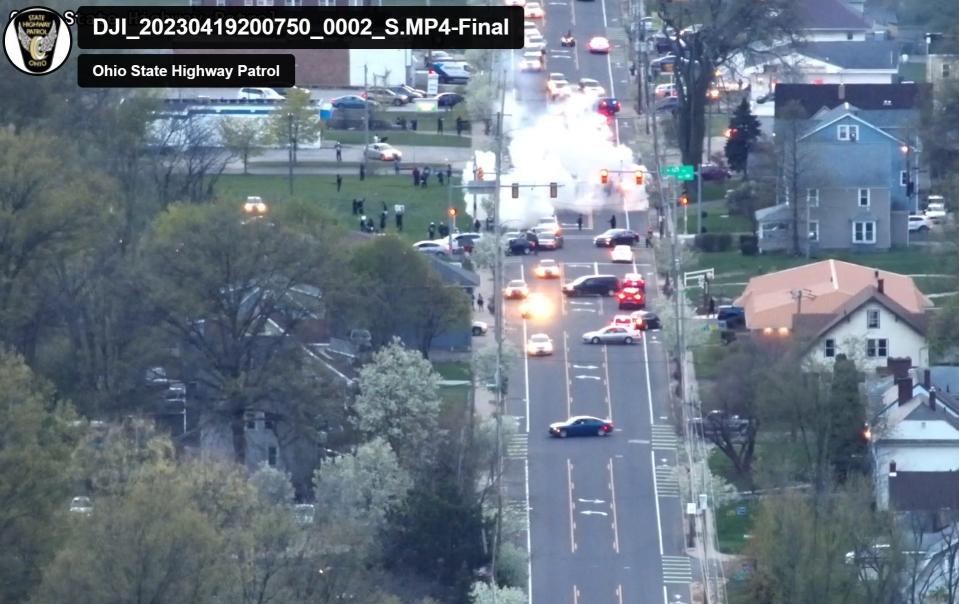 Smoke from tear gas and smoke bombs deployed by law enforcement to disperse protesters on April 19 hangs over Copley Road.