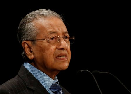 FILE PHOTO: Malaysian Prime Minister Mahathir Mohamad delivers a speech at the International Conference on the Future of Asia in Tokyo