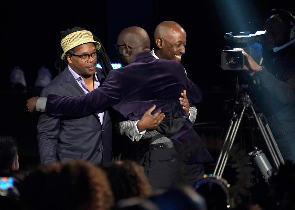 Quentin E. Baxter, from left, Charlton Singleton and Kevin Hamilton of Ranky Tanky react to winning the award for best regional roots music album for "Live At The 2022 New Orleans Jazz & Heritage Festival" at the 65th annual Grammy Awards on Sunday, Feb. 5, 2023, in Los Angeles. (AP Photo/Chris Pizzello)