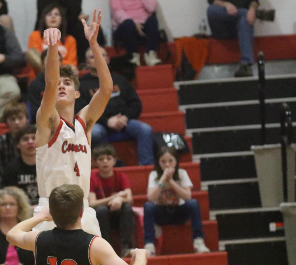Crestview's Dylan Bruner knocks down a corner 3-pointer during the Cougars' 72-61 win over Lucas on Monday night.