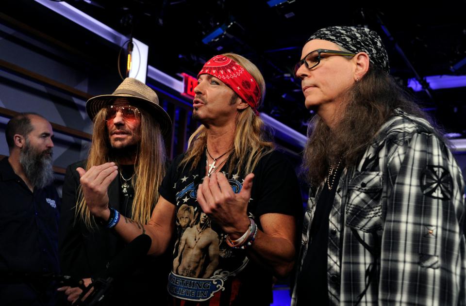 C.C. DeVille, Bret Michaels and Bobby Dall of Poison are interviewed following a news conference to announce The Stadium Tour in 2019.