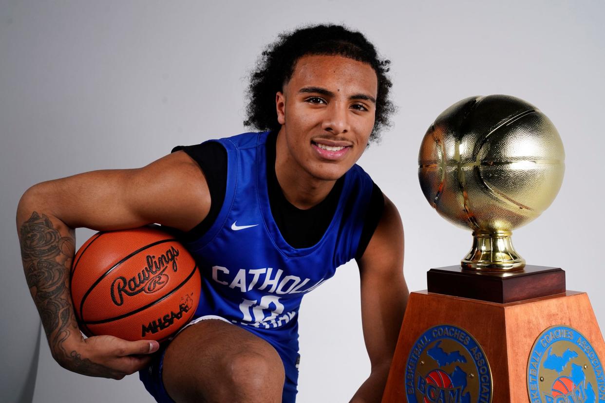 Grand Rapids Catholic Central Durral Brooks accepts the 2024 Hal Schram Mr. Basketball award at the Detroit Free Press on Monday, March 11, 2024.