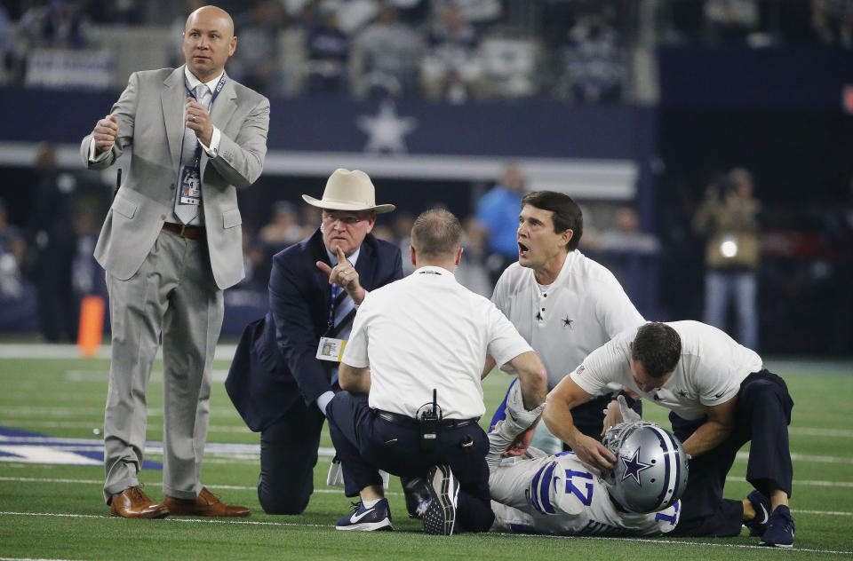 Dallas Cowboys wide receiver Allen Hurns (17) is helped after an injury against the Seattle Seahawks during the first half of the NFC wild-card NFL football game in Arlington, Texas, Saturday, Jan. 5, 2019. (AP Photo/Michael Ainsworth)