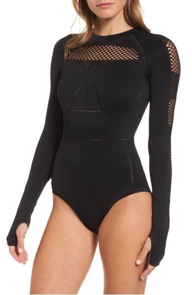 Net bodysuit, <a href="http://shop.nordstrom.com/s/ivy-park-net-bodysuit/4738142?origin=category-personalizedsort&amp;fashioncolor=BLACK" target="_blank">$72 at Nordstrom</a>