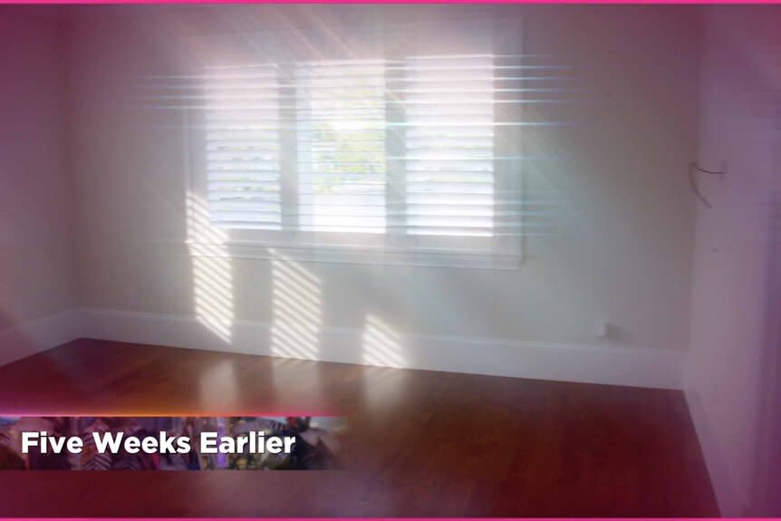 Nicole Martin's son Greyson's room with white walls and wood floors before renovation.